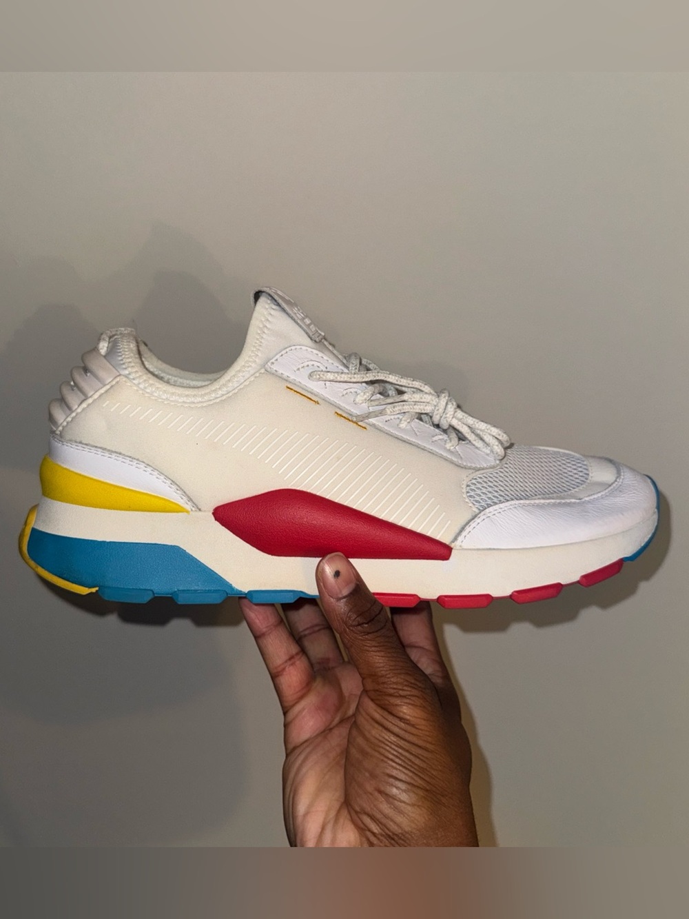 Puma White Sneakers with Red, Blue & Yellow Accents